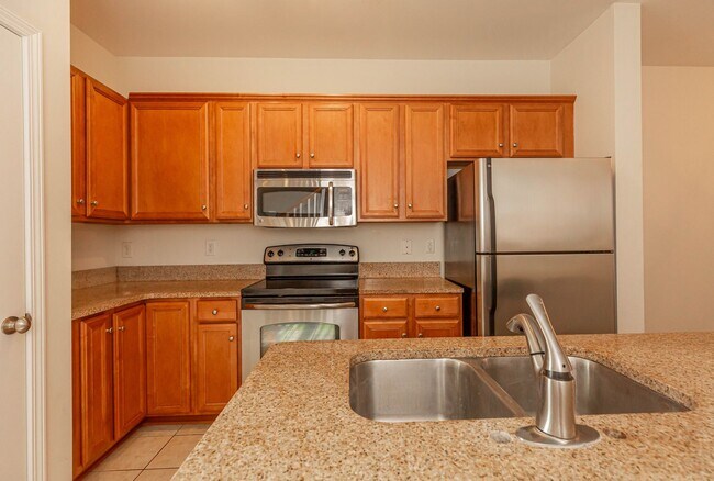 Building Photo - Located just Steps from Shopping, Dining, ...