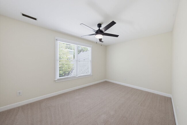Building Photo - Southern Charm Meets Everyday Entertainment and Convenience!