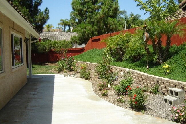 Building Photo - Spacious single-level home located on a quiet corner lot in a well-established Oceanside neighbor...