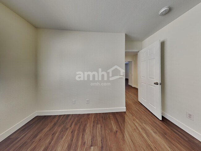 Building Photo - 10749 Artesia Wells St