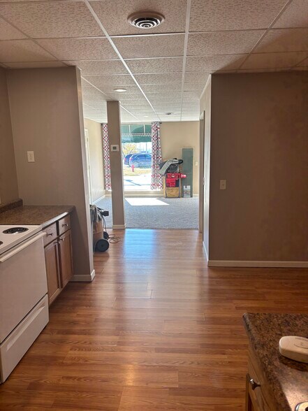 Looking from Kitchen to Livingroom - 211 E Franklin Street