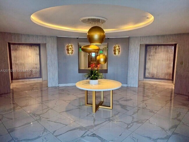 Building Photo - 10275 Collins Ave