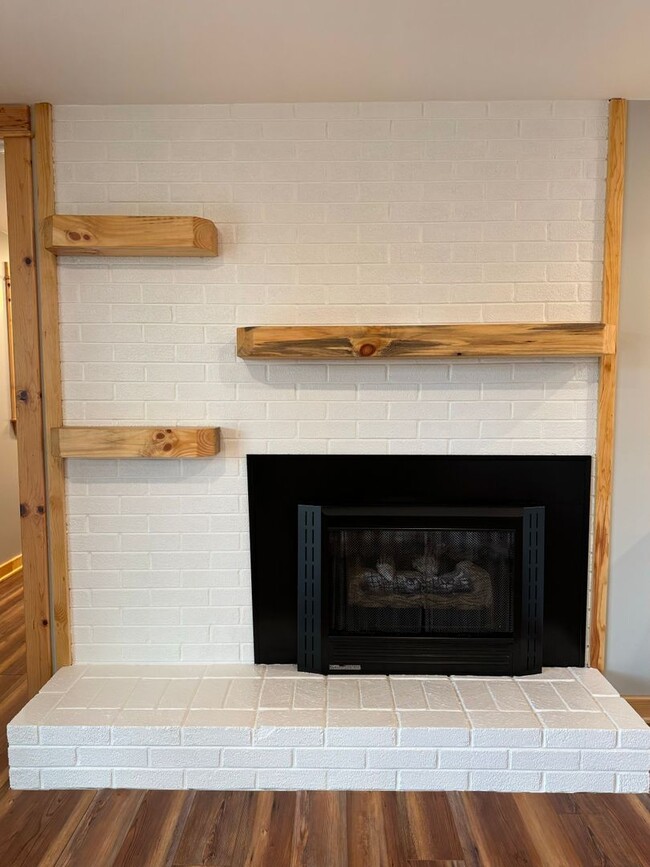 Building Photo - Exquisite Brick Ranch with Modern Upgrades, Countryside Charm And Two Car Garage