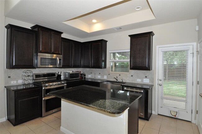 Building Photo - 7709 Menchaca Rd