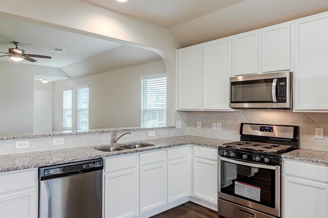 Building Photo - 4922 Blue Jacaranda Wy