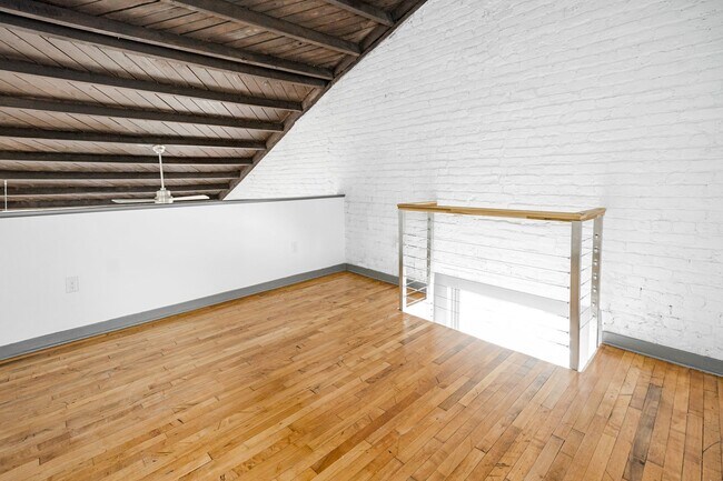 Building Photo - Loft Style with Bay Window and Laundry Room