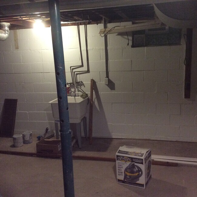 basement utility sink with washer dryer hookup. - 337 Kenwood Avenue