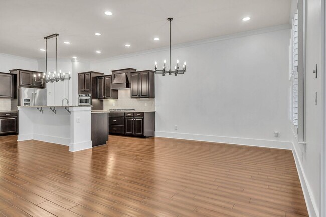 Building Photo - Beautifully maintained and move-in ready, this stunning mostly one-level all-brick home