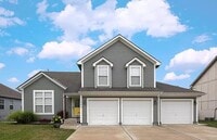 Building Photo - Spacious 4-Bedroom Greenwood Home with Vau...