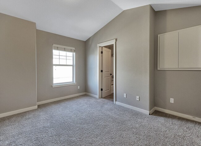 Building Photo - 2BR + 2.1BA Corner Townhome-Style Condo — Dual Primary Suites, Attached Garage & Most Utilities I...