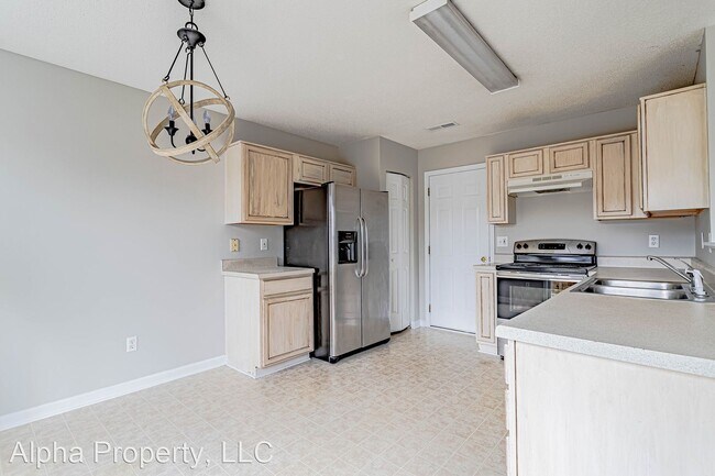 Building Photo - 3 br, 2 bath House - 4 Buzzell Ct