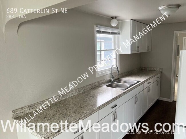 Building Photo - 689 Catterlin Ave. NE
