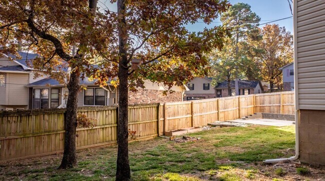 Building Photo - Welcome Home: Charming Brick Beauty with Covered Porch.