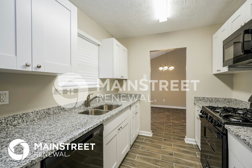 Building Photo - 5450 Forest Downs Cir