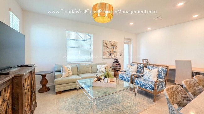 Building Photo - EXCEPTIONAL AND SPACIOUS FURNISHED TOWNHOME WITHIN WATERSIDE- NAUTIQUE!