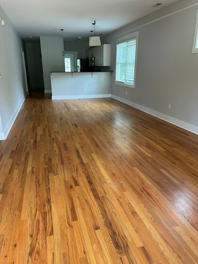 Main-level great room, vacant and ready for move-in (current photo) - 144 Estelle Park Dr