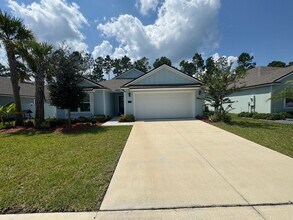 Building Photo - Spacious 4BR/3BA Home in Sawmill Branch at Palm Coast Park! Pool, Tennis & Fitness Center! Pet Fr...