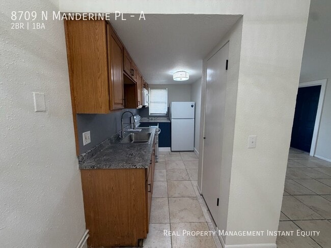 Building Photo - 8709 N Mandarine Pl