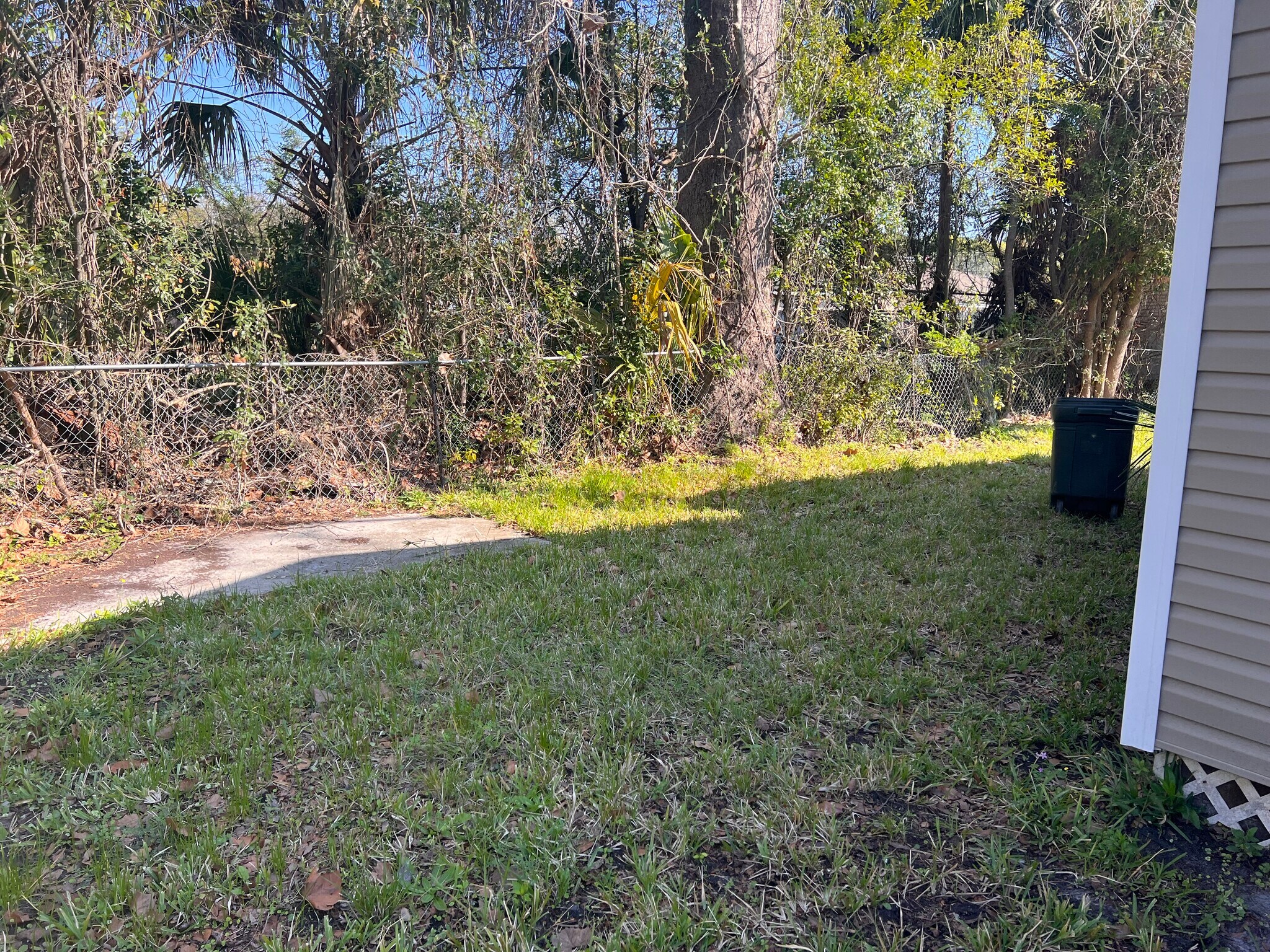 Going around back of house - 2821 W 11th St