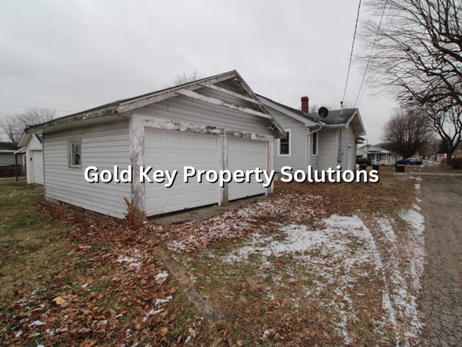 Building Photo - Attractive 2 BR 1 BA House with 2-Car Garage and Covered Porch (NO SECTION 8)