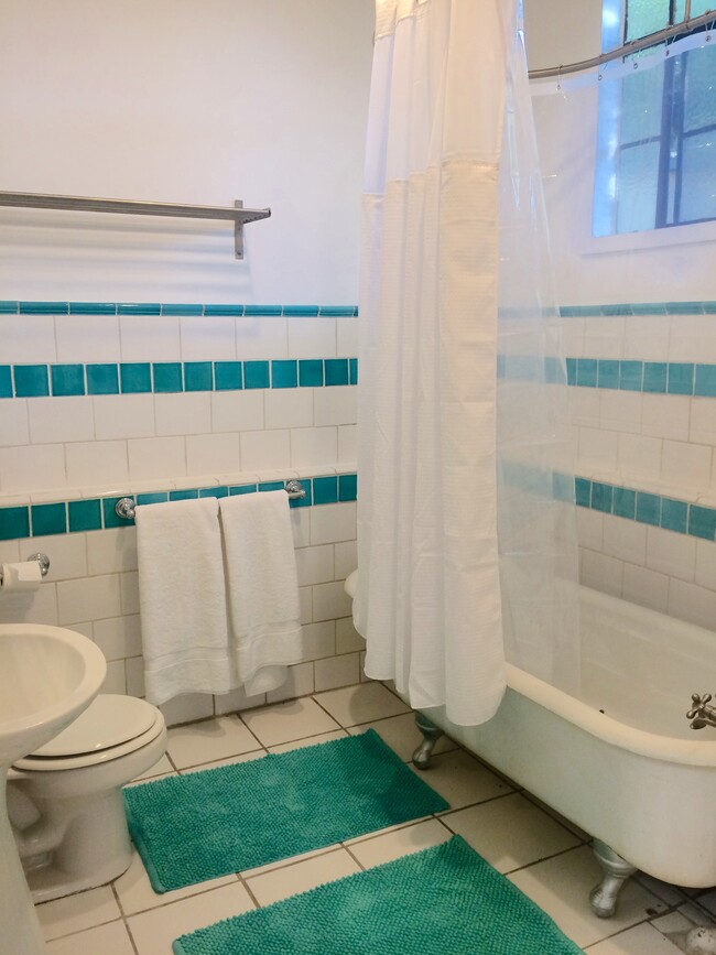 Bathroom with clawfoot tub and shower - 3078 Belden Dr