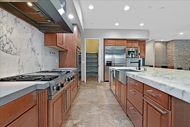 Building Photo - Fully Upgraded 5 Bedroom 4.5 Bathroom in Guard Gated Foothills Community!