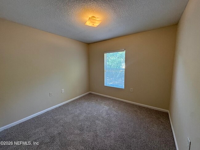 Building Photo - 5051 Playpen Dr