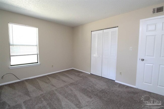 Building Photo - 6801 Tiki Ln