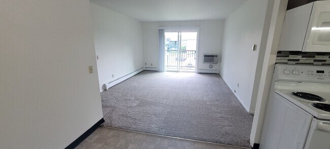 Building Photo - Upper 2 Bedroom Apartment – Heat Included - Available: First Week of June  2026