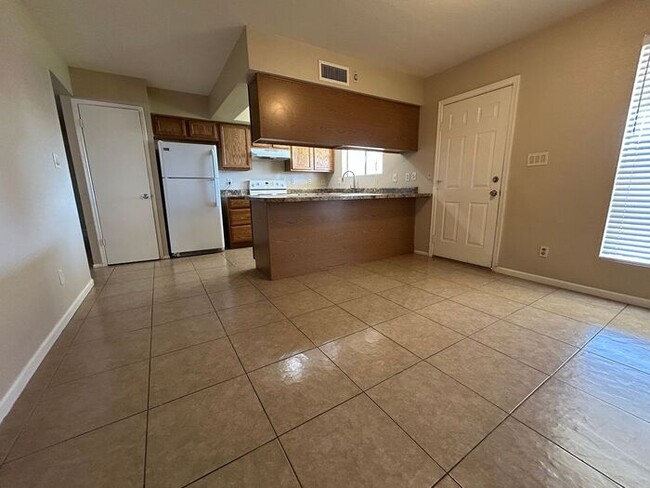 Building Photo - 301 W Olive Ave