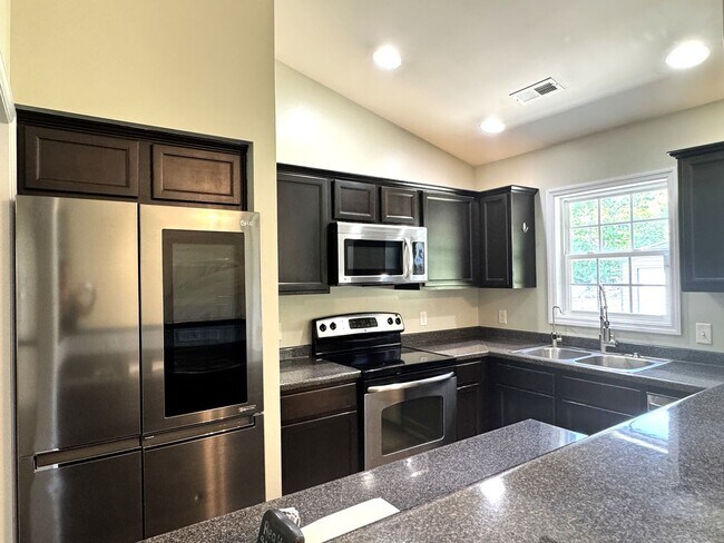 Building Photo - Comfort, Charm & Room for Everything You Love!