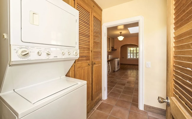 Building Photo - Charming Spanish Style Cottage with Incredible Deck- Gardener's Delight!