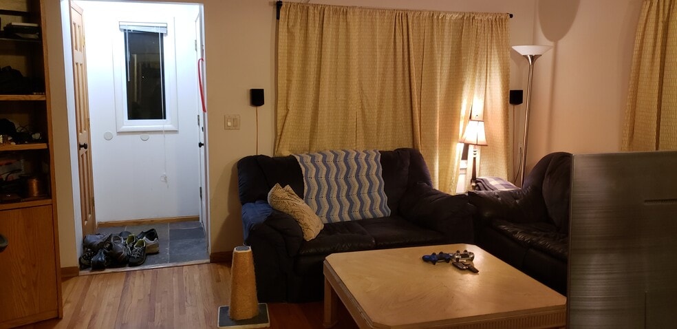 Living room - furnished. - 574 37th Ave NE