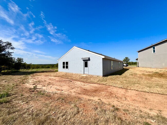 Building Photo - New 4 bedroom, 2 bath in Treaty Oaks Community