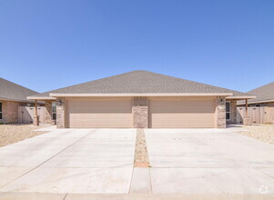 Building Photo - 3/2 in North Lubbock 1/2 off first months ...