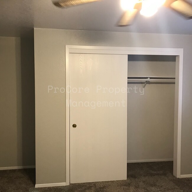Building Photo - $1300...2Bed 1.5 Bath, Small Fenced in Covered Patio on Back, Storage