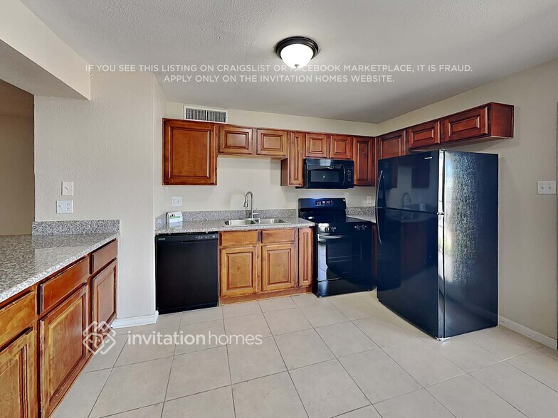 Building Photo - 3319 W Port Au Prince Ln