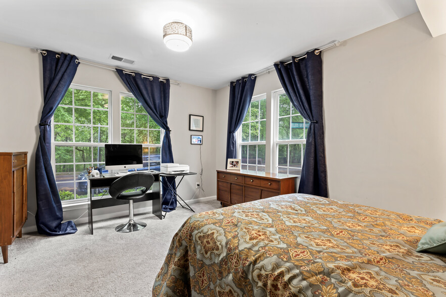 Bedroom, one single bed, desk, and dresser - 12909 Bullock Greenway Blvd