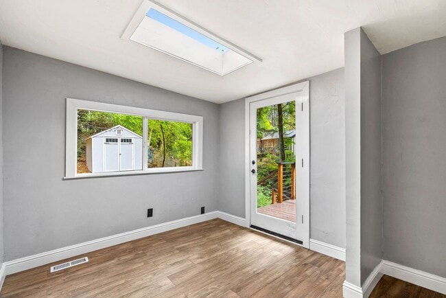 Building Photo - 1st Month FREE!! Riverfront Haven with Pri...