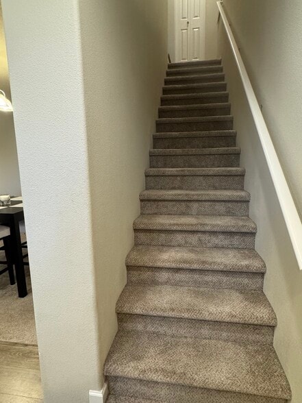 Stairs up to the top (third) floor - 13102 SW Aubergine Ter