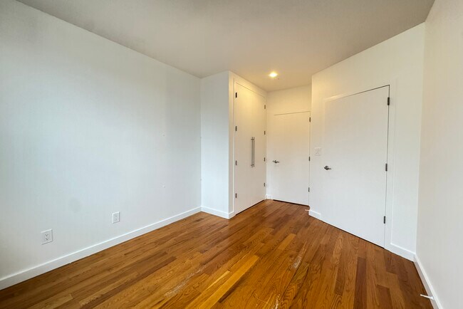 Building Photo - 51 E 128th St