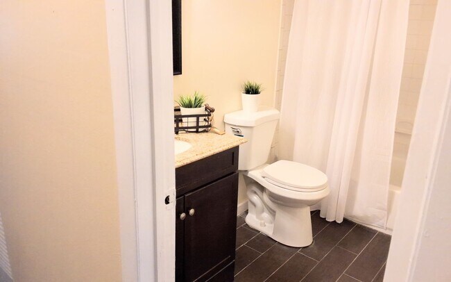 Building Photo - Stunning all remodeled 2/1.5 condo with Am...