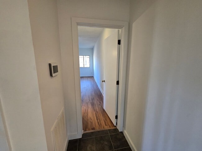 Building Photo - Multigenerational or Grad Student Living! Spacious One-Story End Unit in Prime Location on 54