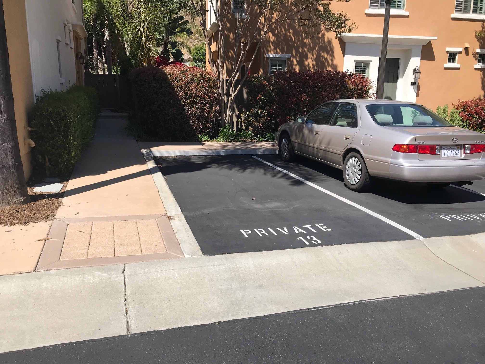 Additional dedicated parking space with no one on your driver side. - 2626 Bellezza Dr