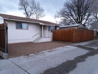 Building Photo - Charming 2 Bedroom Home Near Wells District – A/C, Fenced Yards & Greenhouse