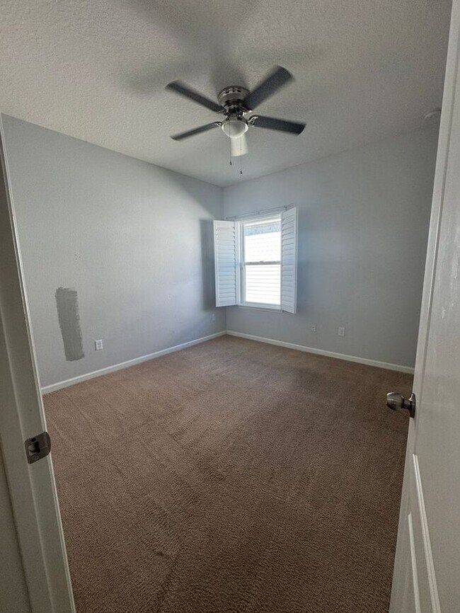 Building Photo - COMING SOON! Beautiful 4BR 3BA Home w/ Screened Lanai & Pond View • Garage Parking • Fenced Yard ...