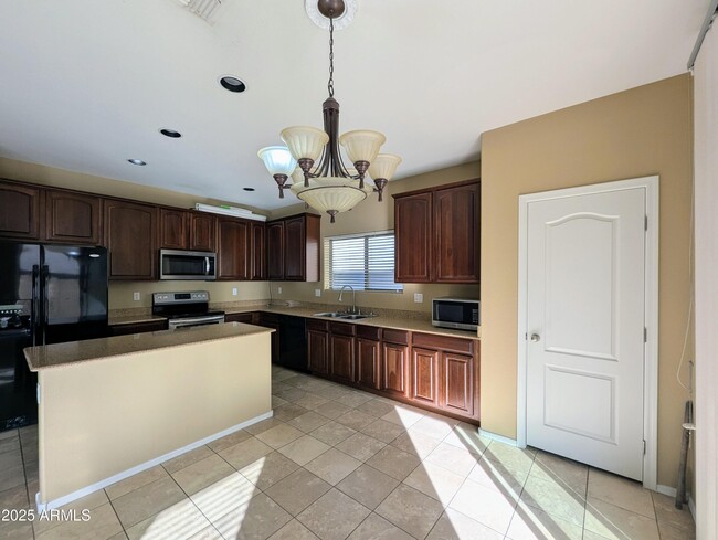 Building Photo - 6455 W Orchid Ln