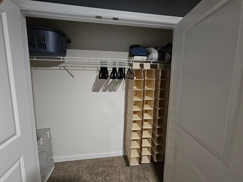 The closet is ready for your things to be organized and easily assessable. - 7201 Hancock Chase Ct