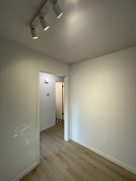 Hallway going to Bedrooms 2 & 3 - 2201 Pin Oak Rd