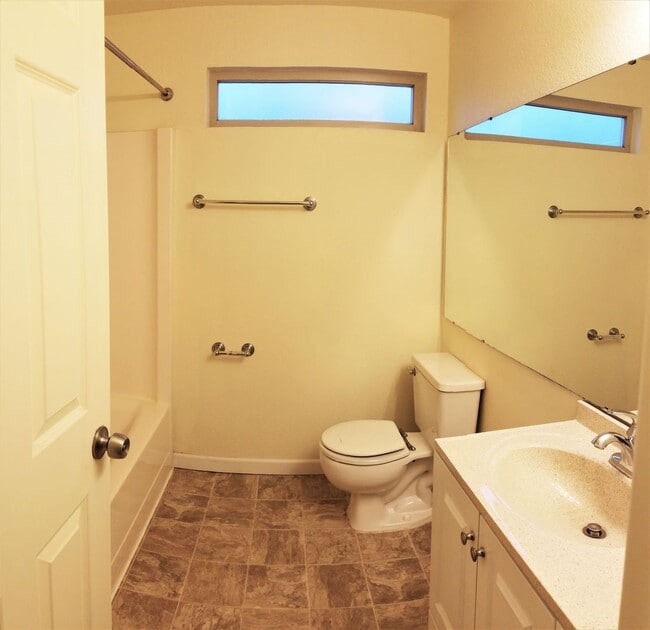 Building Photo - Spacious 4-Bedroom Home with Fenced Yard &...